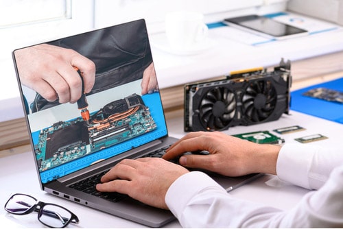 Reparación de Laptops laptop abierta laptop rota técnicos reparando